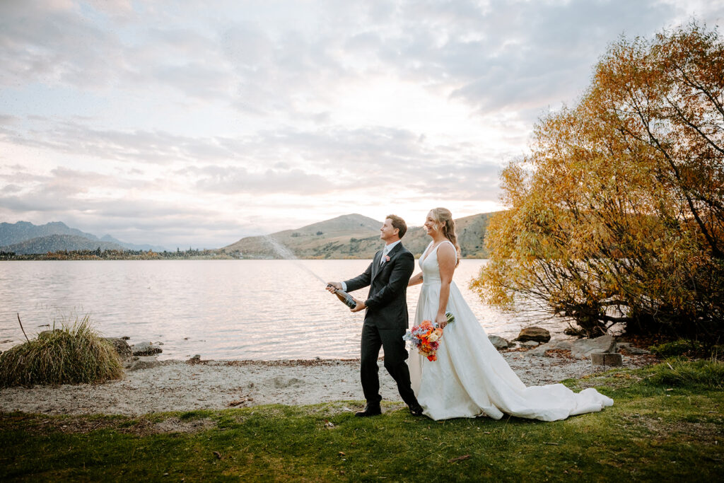 bride and groom after wedding ceremony at lake hayes queenstown new zealand